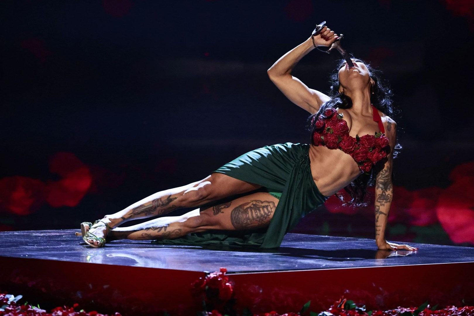 Heather Holliday sword swallowing live and competing on Britain's Got Talent in custom RYCE NYC costume